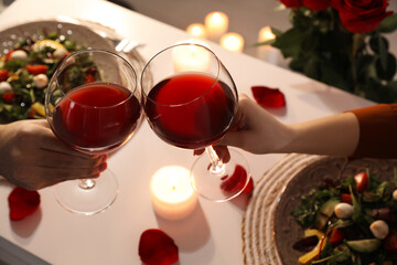 Couple having romantic dinner at home, above view