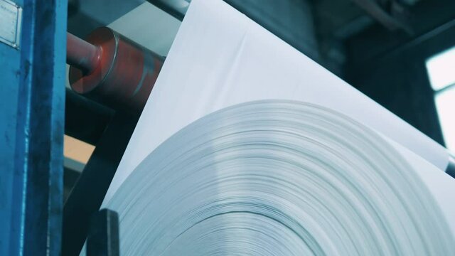 Modern paper converting machine in a close up