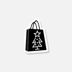 Christmas paper shopping bag sticker icon isolated on white background