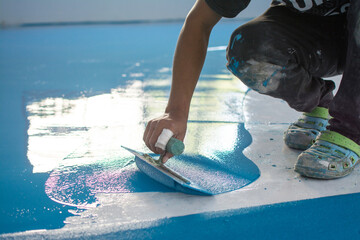 Self-leveling blue epoxy floor