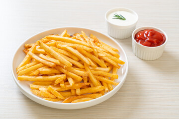 French fries with sour cream and ketchup