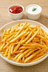 French fries with sour cream and ketchup