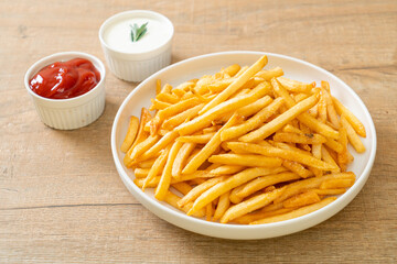 French fries with sour cream and ketchup