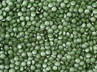 Pile of spirulina tablets background