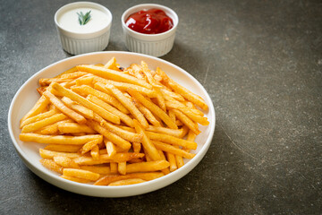 French fries with sour cream and ketchup