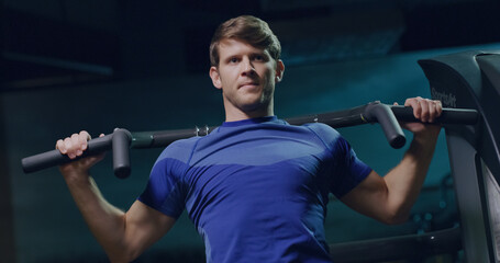 Determined Young Sportsman Shoulder Pull Down Machine At The Gym Healthy Life Stamina Health Focused Fitness Concept