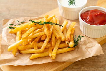 French fries with sour cream and ketchup