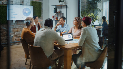 Diverse Team of Professional Businesspeople have Meeting in the Modern Office Conference Room....