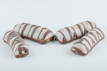 Delicious chocolate bars on a white background