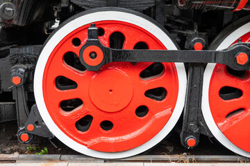Wheels at engine of a historic, old stream train at former site of Jiangwan Station of historic Woosong or Songhu Railway built in 1876 in Hongkou District, Shanghai, China.
