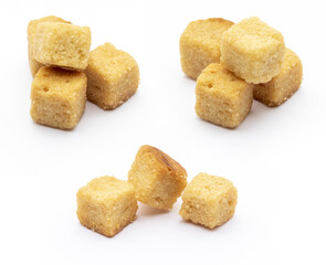 Cluster crispy croutons. Cubes of bread toasted and fried in oil. Isolated white background