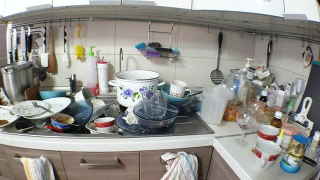dirty dishes in the kitchen after a party