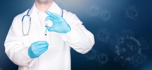 Close up of hands of doctor preparing for vaccination