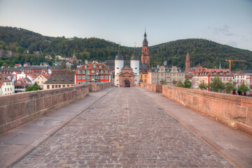 Sunrise view of the old bridge gate in Heidelberg, Germany