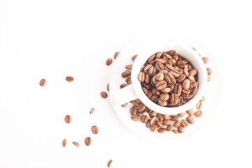 Empty cup of coffee on white background with coffee beans.