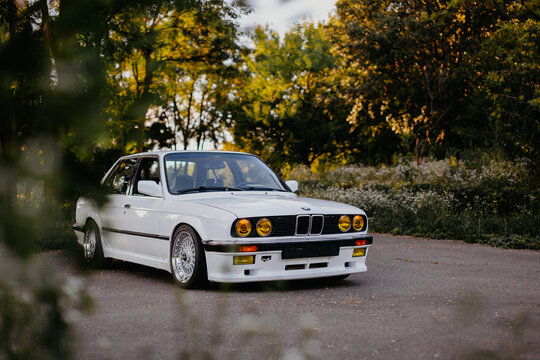 Berlin, Germany - July 07, 2020: BMW M3 e30 outdors, BBS wheels, tunning M Tech, glossy and shiny old classic retro oldtimer. Auto nostalgia show.