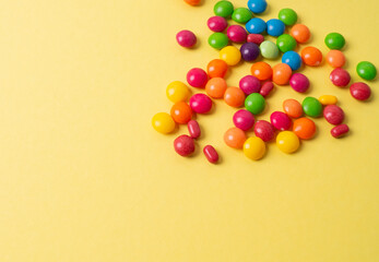 Obraz premium colorful little candies on a colored background