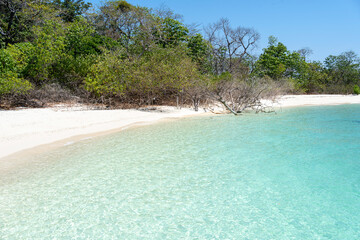 Tourists are taking pictures with the symbols of the island. Koh Kai, Satul city, Thailand. 14 Feb 2021.