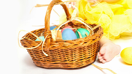 Fototapeta na wymiar Easter basket with painted eggs
