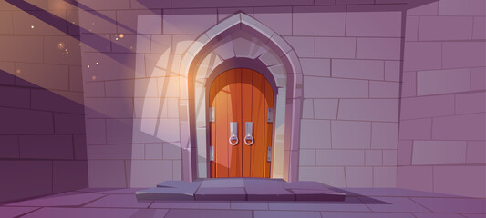 Medieval dungeon or castle interior with wooden arched door and wall of stone bricks, entry to palace with sunlight fall through barred window. Fairytale building exterior, Cartoon vector illustration
