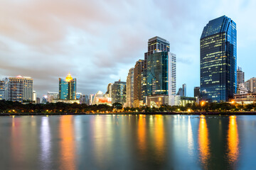 Bangkok Cityscape, Business district with Park in the City at dusk