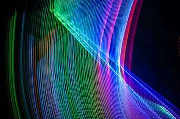 Light painting abstract background. Colored light painting photography, long exposure, ripples and...