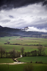 Fototapeta na wymiar Mountain landscape with clouds in winter