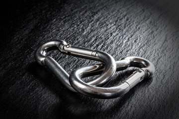 two snap hook on black background