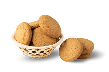 basket with oatmeal cookies isolated on white background