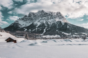 panoramic view of the Zugspitze and Ehrwald in winter. - obrazy, fototapety, plakaty
