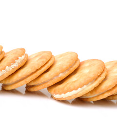 vanilla sandwich cookies on white background