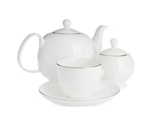 Ceramic cup with saucer, teapot and sugar bowl on white background