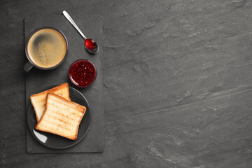 Tasty breakfast with coffee, toasts and jam on dark table, flat lay. Space for text