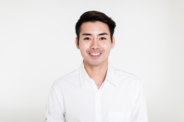 Young and handsome healthy Asian woman with a friendly smiley face and positive happy pose on a plain background. Concept for joy, proud, self-confident, and successful male in business and life