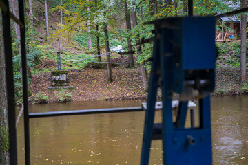 metal cable stretched across the river is intended for crossing