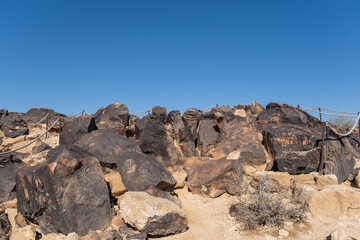 Fototapeta na wymiar Petroglyphs or Rock Engraving at Negev Mountains, Israel
