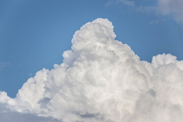 Naklejka na ściany i meble white cumulus clouds against the sky