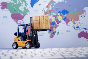 Logistic concept. Forklift truck lifting cargo shipping container box with worldmap background use...