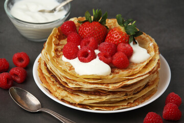 Russian cuisine national dish bliny with fresh berries