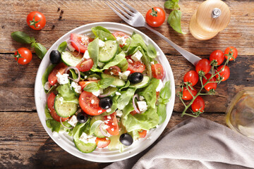 vegetable salad with cucumber, tomato and cheese