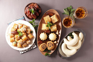traditional arabic dessert baklava, dates, mint tea