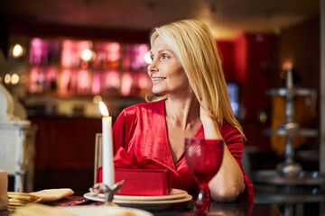 Independent lady enjoying evening at the restaurant