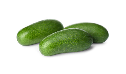 Fresh whole seedless avocados isolated on white