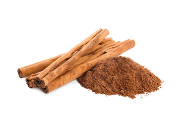 Aromatic cinnamon sticks and powder on white background