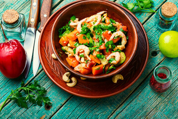 Exotic salad with tamarillo and prawn