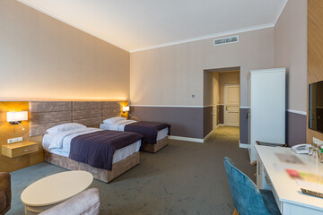Interior photography, modern hotel room, with twin beds, in modern style
