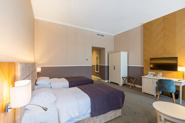 Fototapeta na wymiar Interior photography, modern hotel room, with twin beds, in modern style