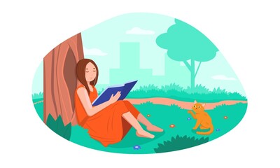 Pakrk. The girl reads a book in nature. Walk in the woods.