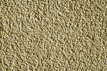 wall texture, plaster on a block of flats with small stones