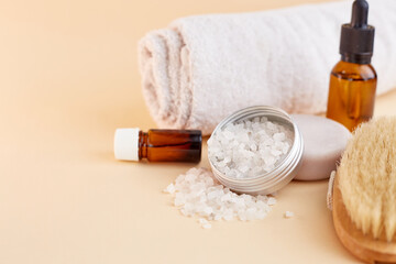 Set of home SPA cosmetic products. Dry Brush, Sea Salt, Scrub, Organic Oil, Towel. Anti-cellulite brush for dry body massage. Women's organic scin care. Prevent cellulite and body problem at home